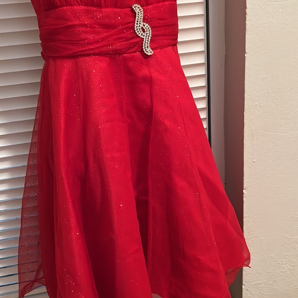 a formal dress it’s color red with sparkles it’s really shiny xs or small - Picture 2 of 4